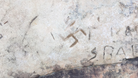swastika carved in rock