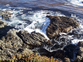 Waves breaking on rocks