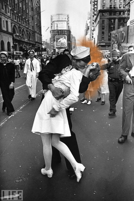 Figure 11 LIFE photograph of the V-E Day kiss with the pepper-spraying cop. In the original photo, a sailor passionately kisses a woman in a white dress, dipping her backwards. In the meme, the cop approaches from behind and pepper sprays them.