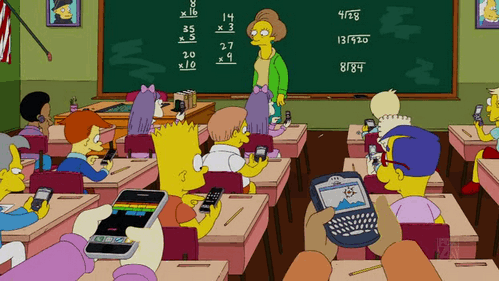 Classroom scene from Bart Simpson show with all students texting while teacher looks on in frustraton