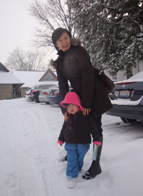 Yu-Kyung with her daughter, Sol