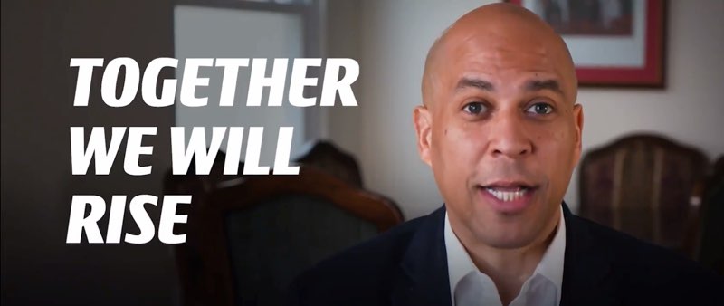 The screenshot captures the full sentence slowly appearing from the previous screen: “TOGETHER WE WILL RISE.”