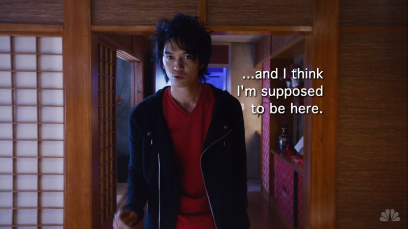 Ren is standing in a room. Open subtitles appear next to him that state, “…and I think I'm supposed to be here.”