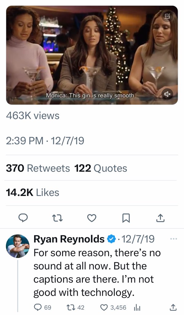 The screenshot shows two tweets by Ryan Reynolds. The first tweet is a video that shows a moment with three women at a bar. Open captions at the bottom of the video read, "Monica: This gin is really smooth." The second tweet is Reynolds’ response to the first tweet, "For some reason, there's no sound at all now. But the captions are there. I'm not good with technology."