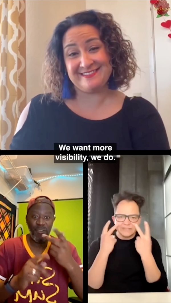 Three individuals are in this vertical video. Melissa Yingst is in the top half and is smiling. Wawa is in the bottom left. Sean Forbes is in the bottom right and is signing the word "visibility." Subtitles are in the center of the frame between all three of them. The subtitles read, "We want more visibility, we do."